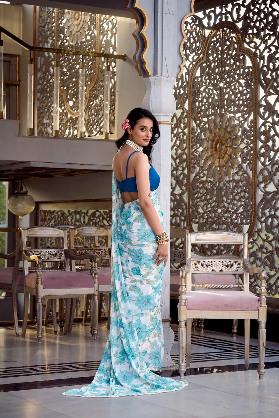 Sea Blue Weightless Marbal Saree With Floral Print & Pearl Lace Border