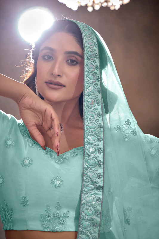 Turquoise Blue Net Thread & Sequence Embroidery Work Lehenga Choli