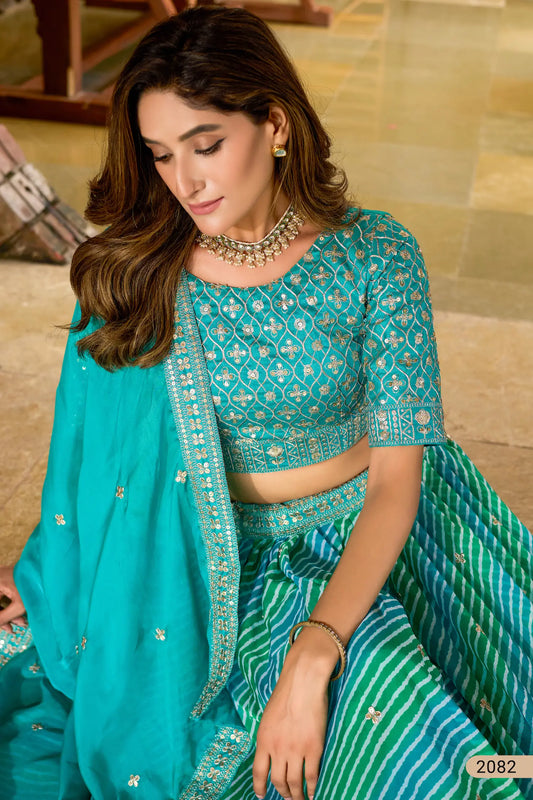 Turquoise Blue Silk Lehenriya Print & Embroidery Lehenga Choli