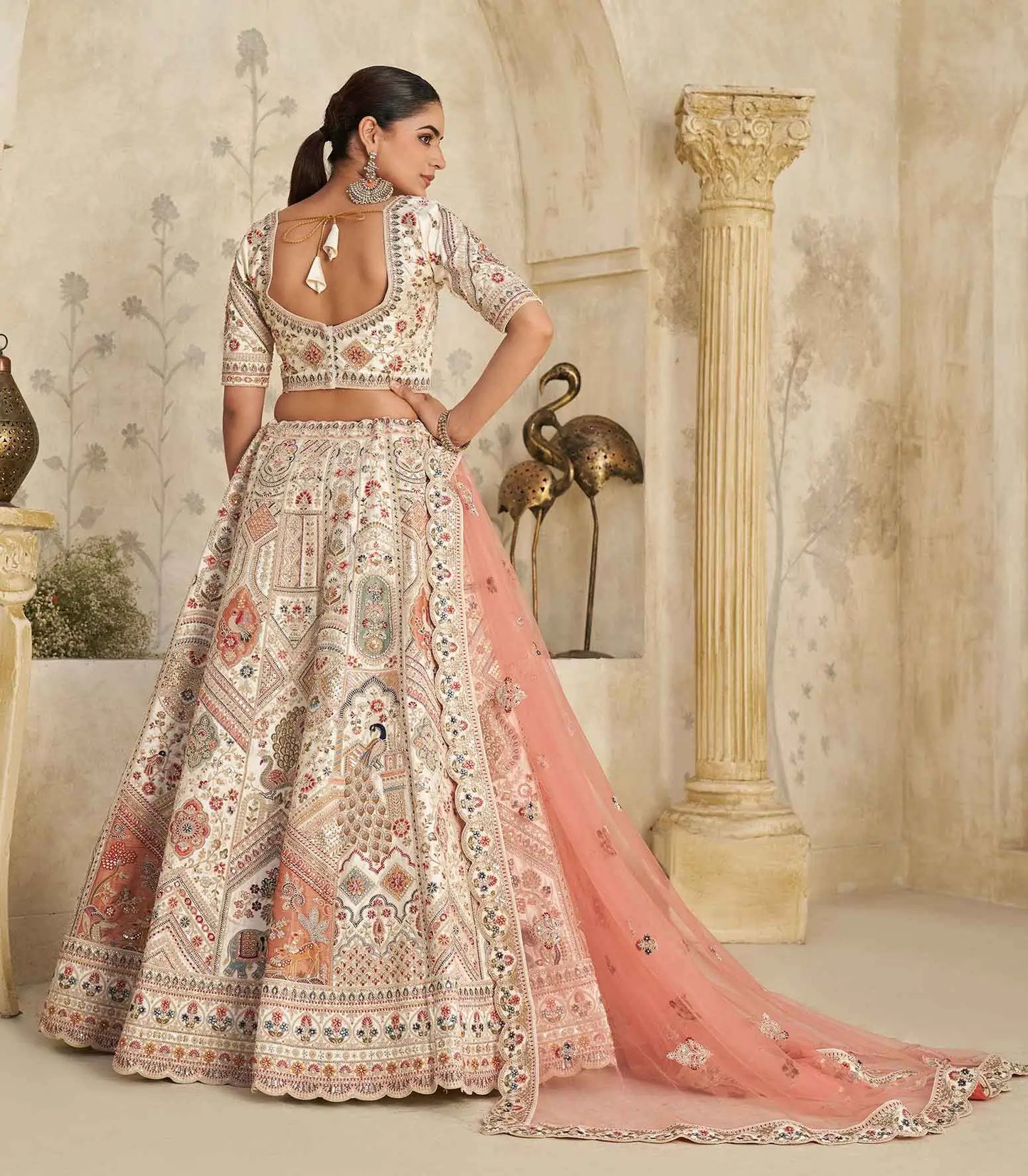 Cream Lehenga With Intricate Royal Embroidery Motifs