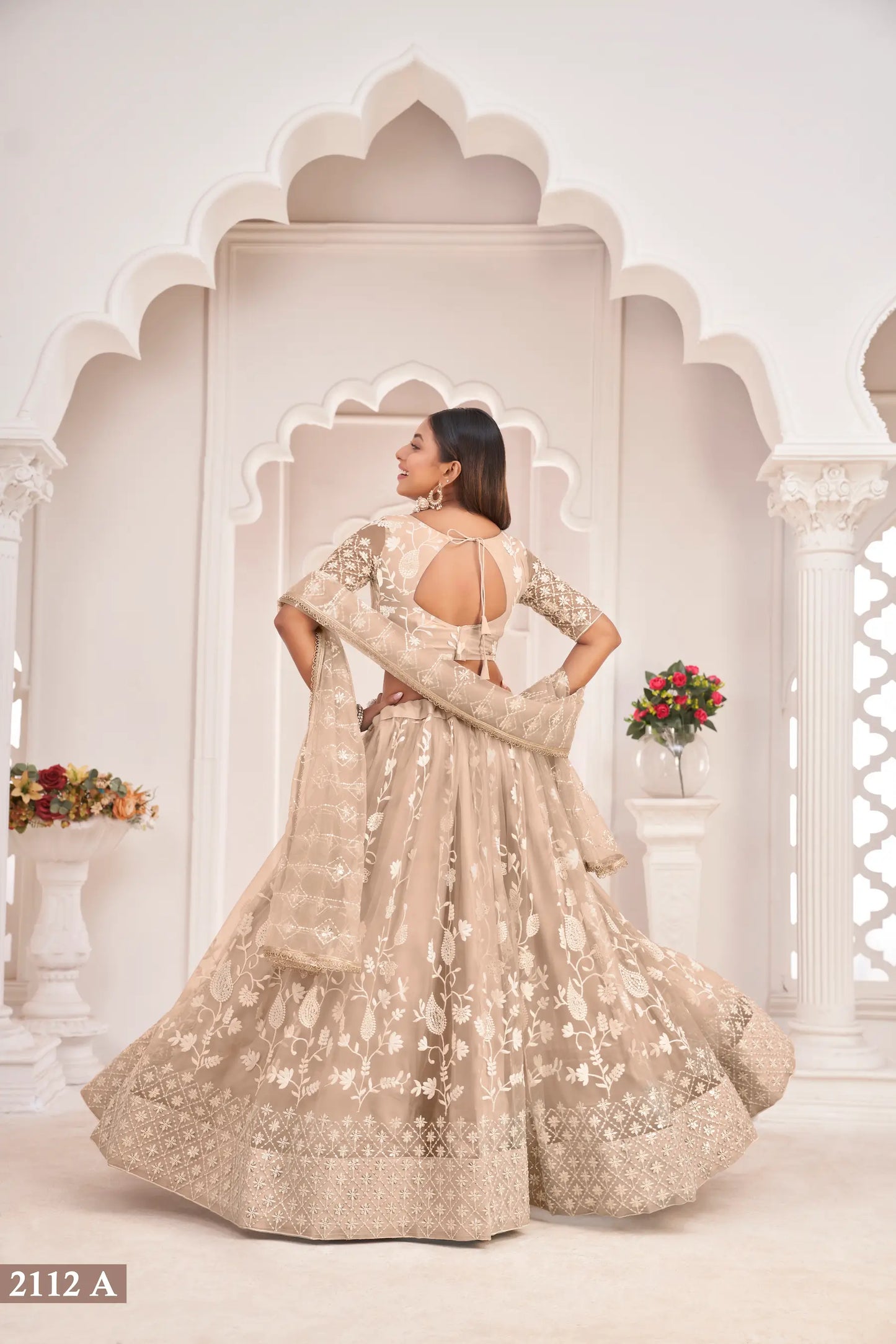 Beige Net Lehenga Choli With White Cotton Thread Work, Zari Work & Sequence Work