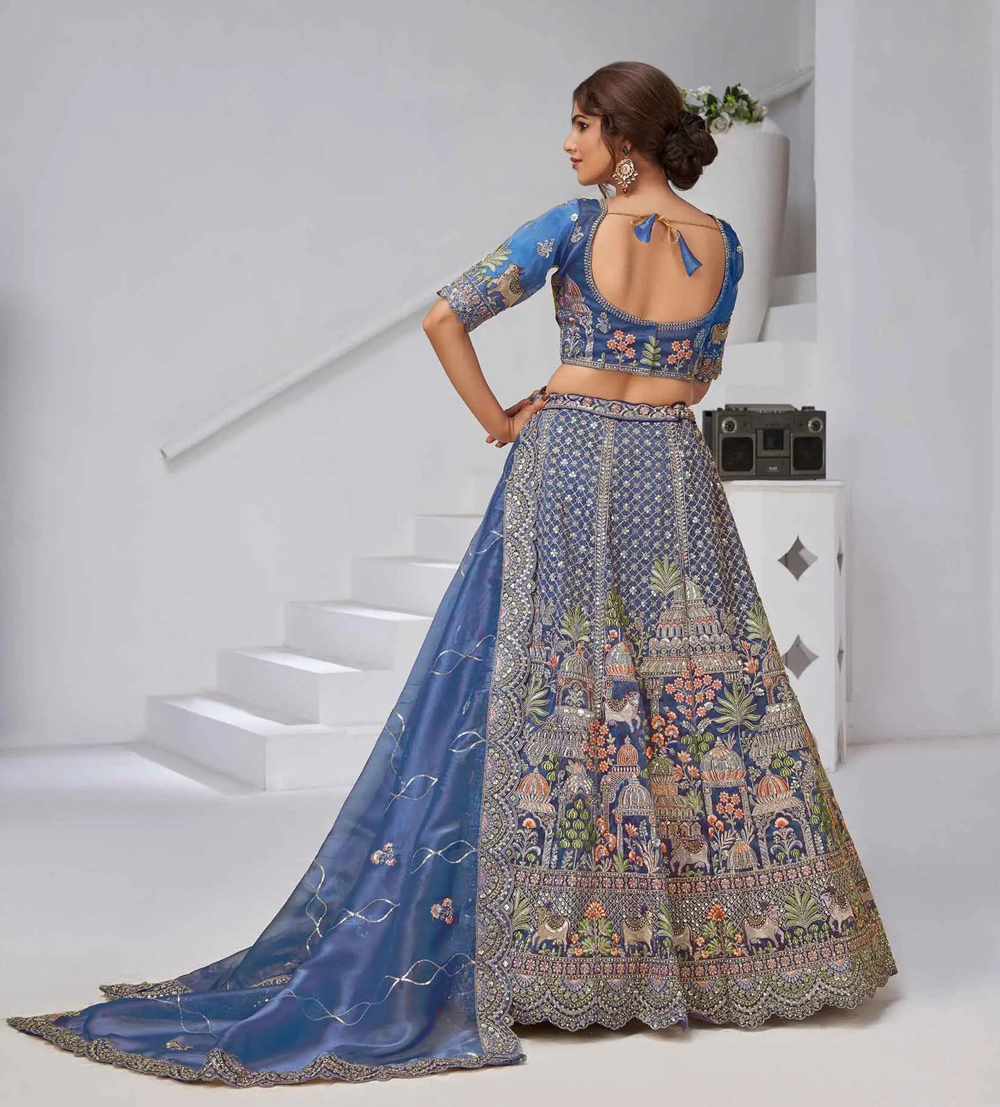 Dusty Blue Bridal Lehenga With Temple & Cow Motifs