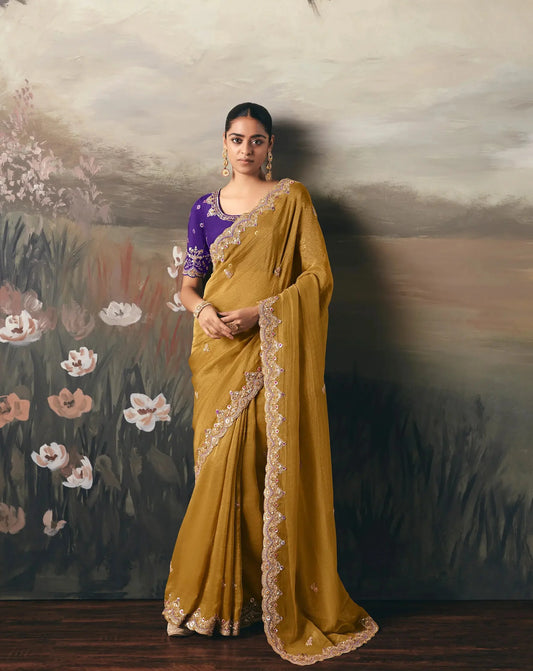 Turmeric Yellow Heavy Embroidered Tissue Silk Saree