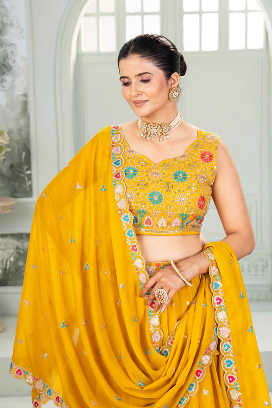 Yellow Star Georgette Sequins Embroidery Work Lehenga Choli