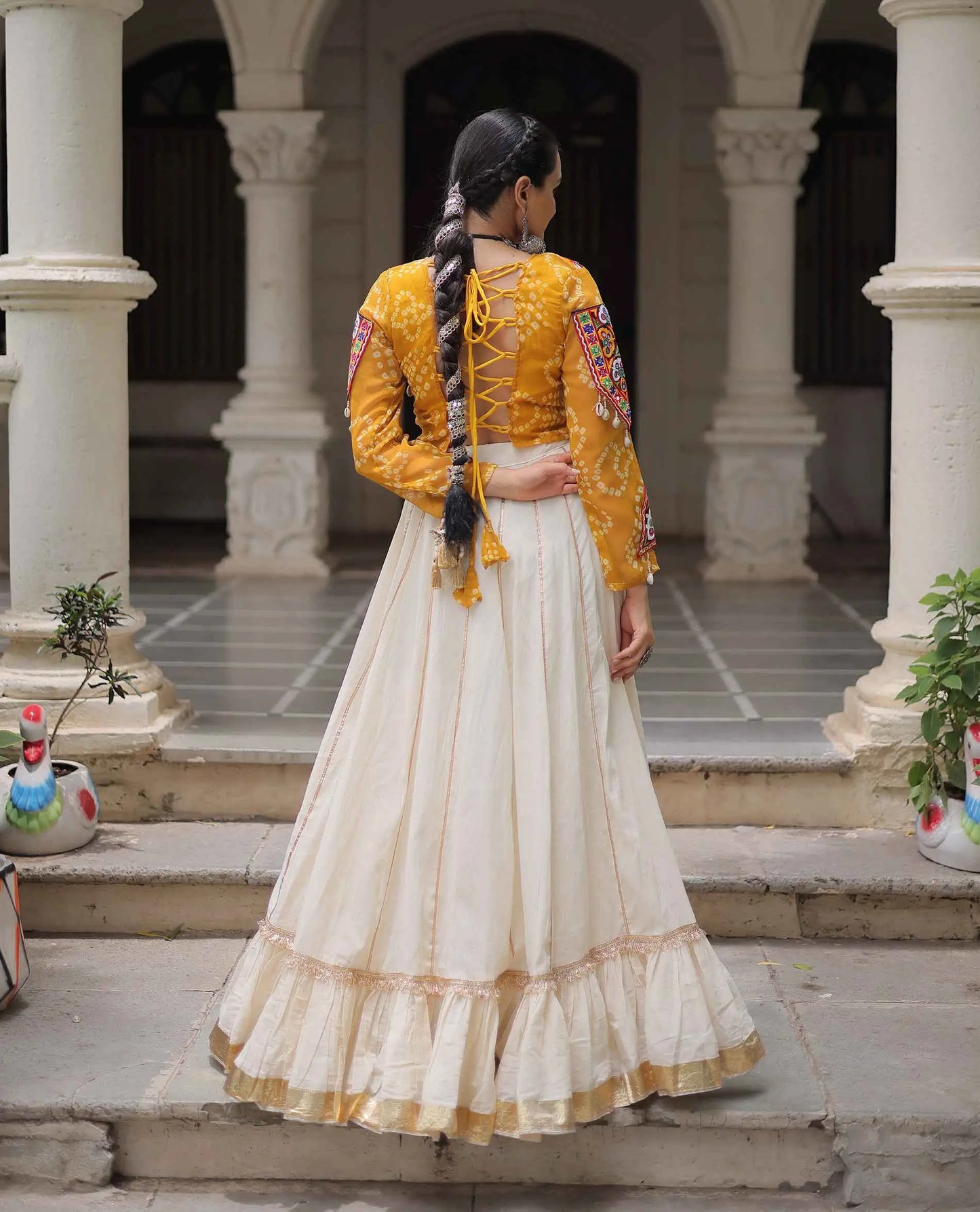 Yellow Bandhani Print Gamthi Work Blouse With Lace Work Navratri Lehenga