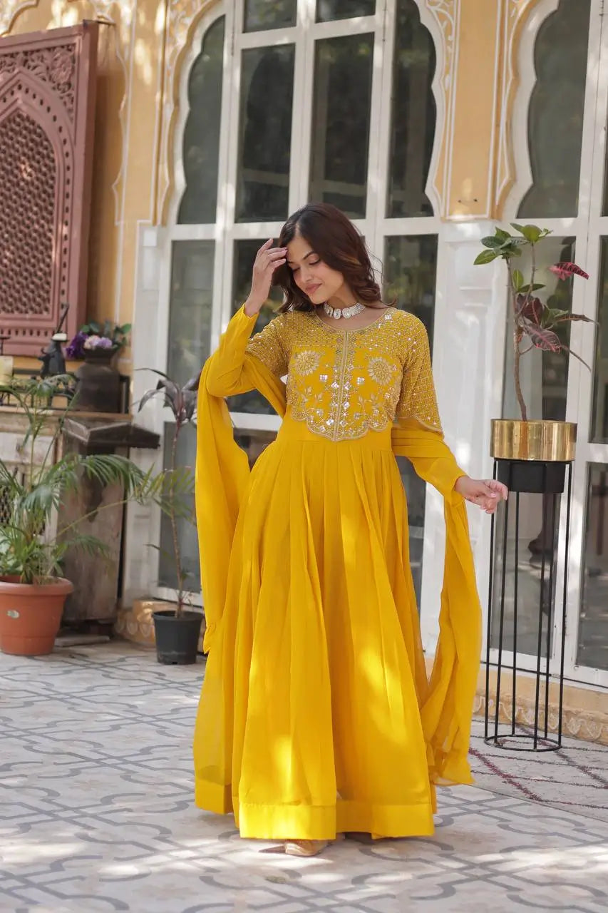 Yellow Ochre Attractive Sequins Embroidery Work Gown And Dupatta