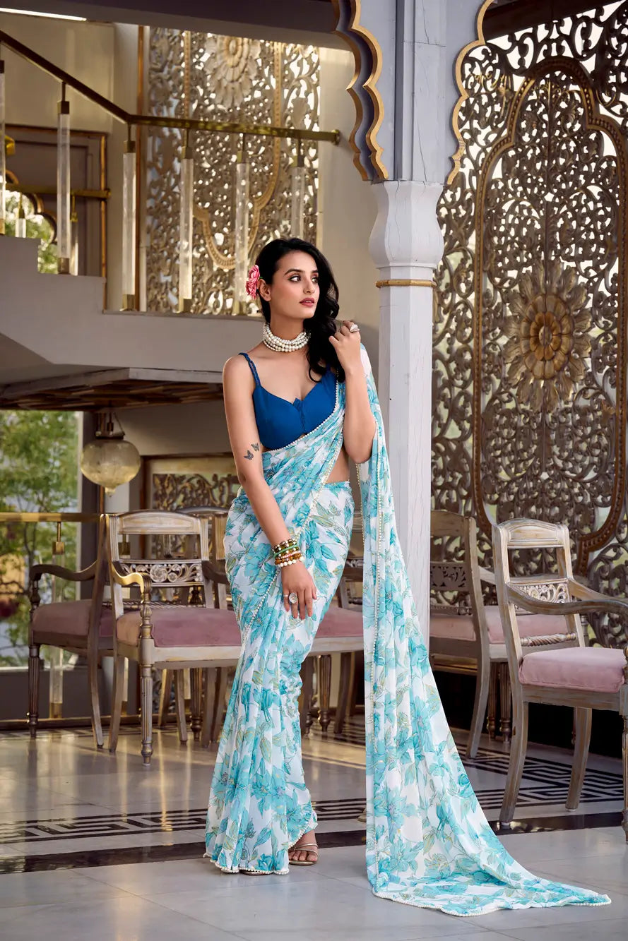 Sea Blue Weightless Marbal Saree With Floral Print &  Pearl Lace Border