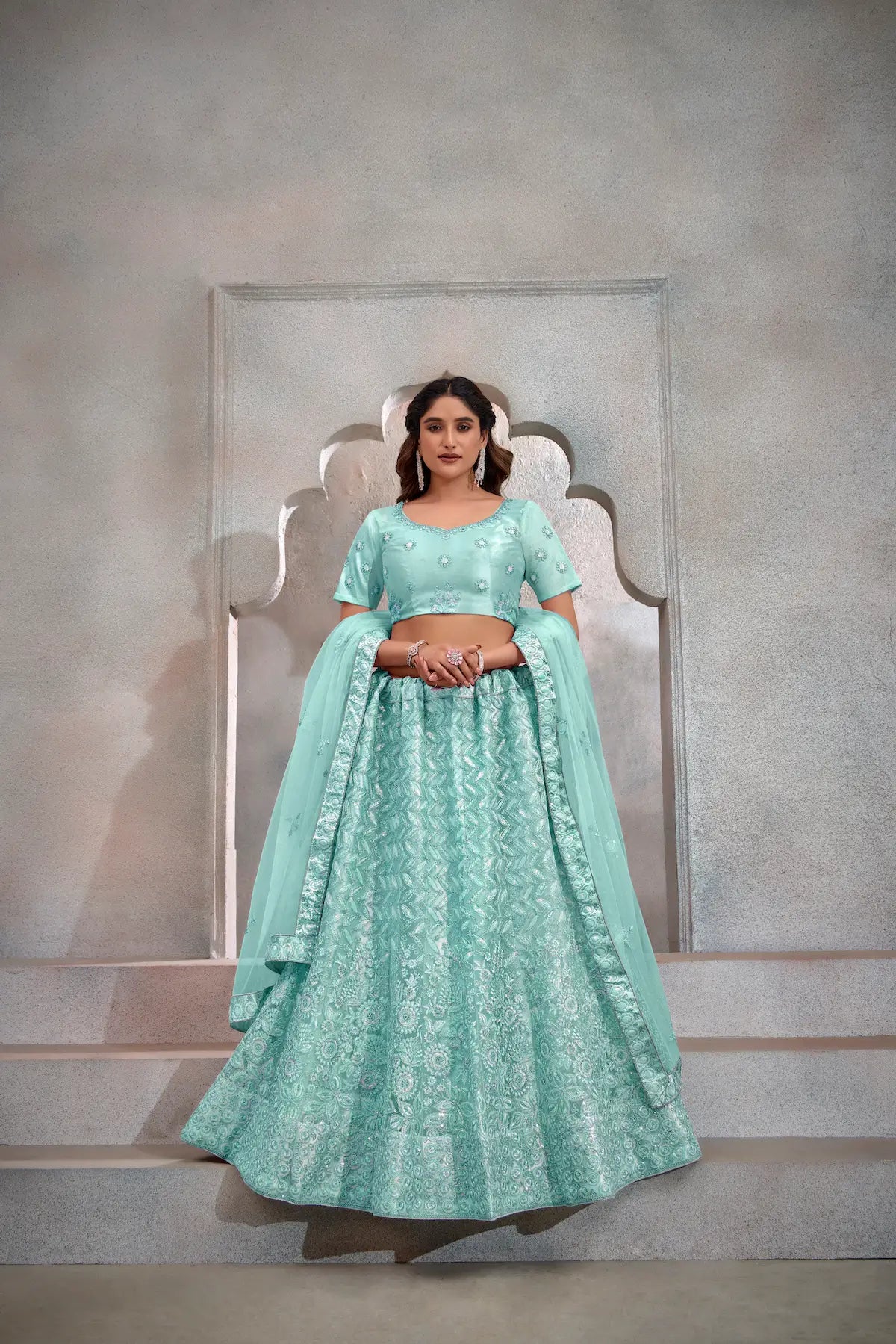 Turquoise Blue Net Thread & Sequence Embroidery Work Lehenga Choli