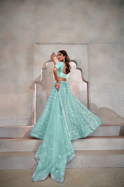 Turquoise Blue Net Thread & Sequence Embroidery Work Lehenga Choli