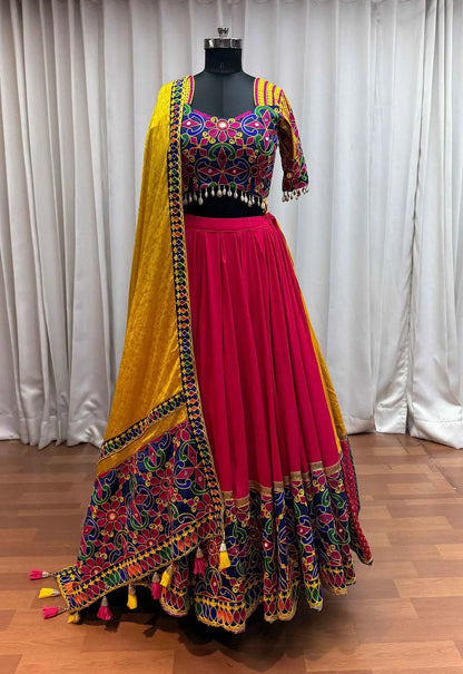 Pinkish Red And Yellow Thread Embroidery And Mirror Work Navratri Lehenga