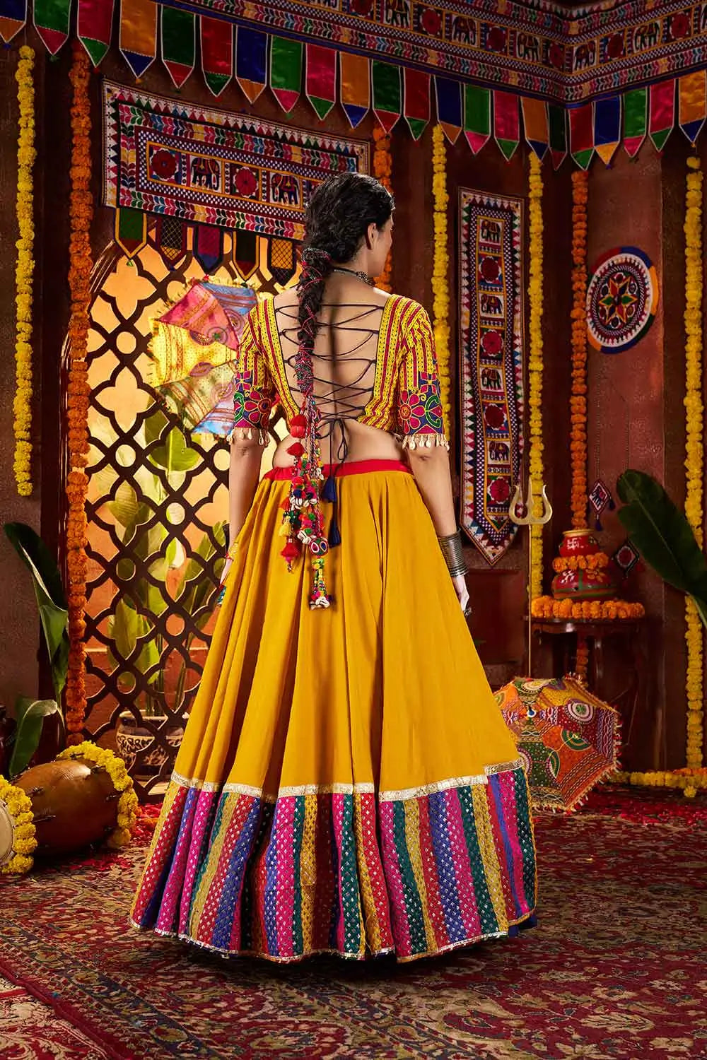 Pinkish Red And Yellow Thread Embroidery And Mirror Work Navratri Lehenga