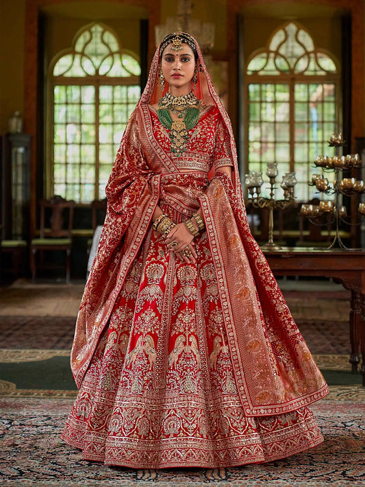 Red Bridal Lehenga Featuring Rich Embroidery & Pearl