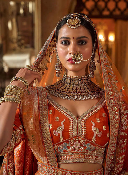 Orange Bridal Lehenga With Heavy Embroidery & Pearl Work