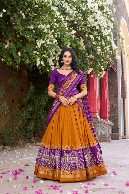 Mustard Tussar Silk Patola Print And Foil Work Lehenga Choli