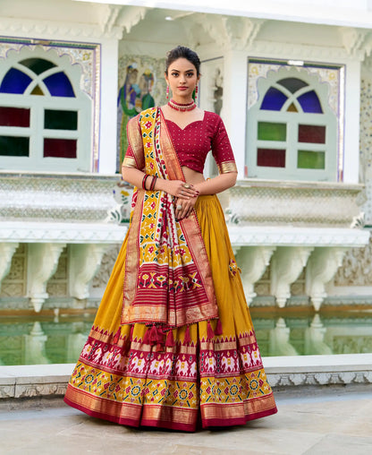Mustard Tussar Silk Lehenga Choli With Patola Print And Foil Work
