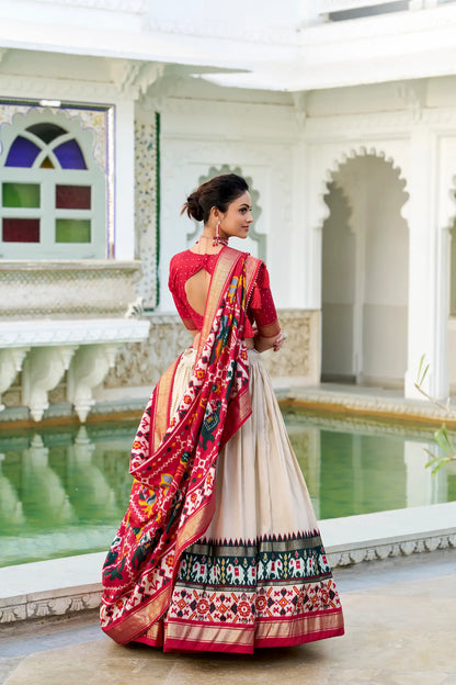 Beige Tussar Silk Lehenga Choli With Patola Print And Foil Work