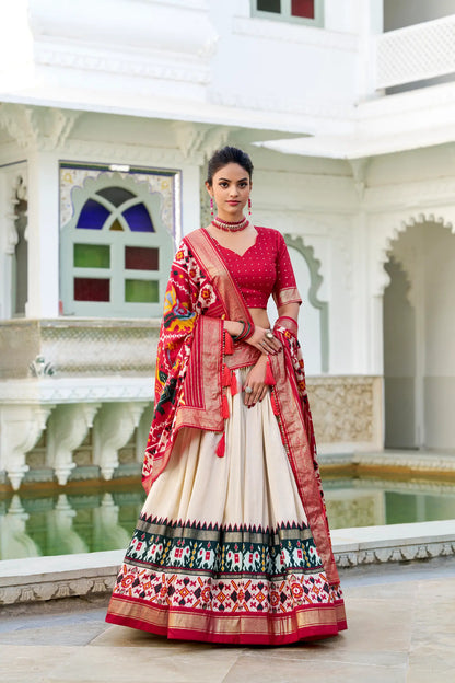 Beige Tussar Silk Lehenga Choli With Patola Print And Foil Work