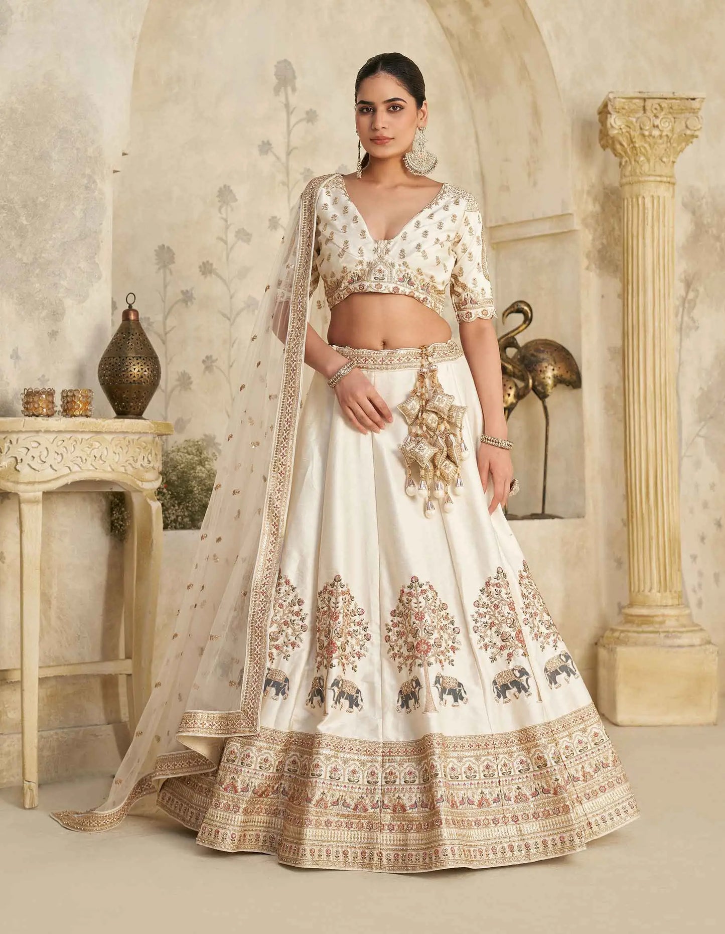 Cream Lehenga With Intricate Elephant Zari Work