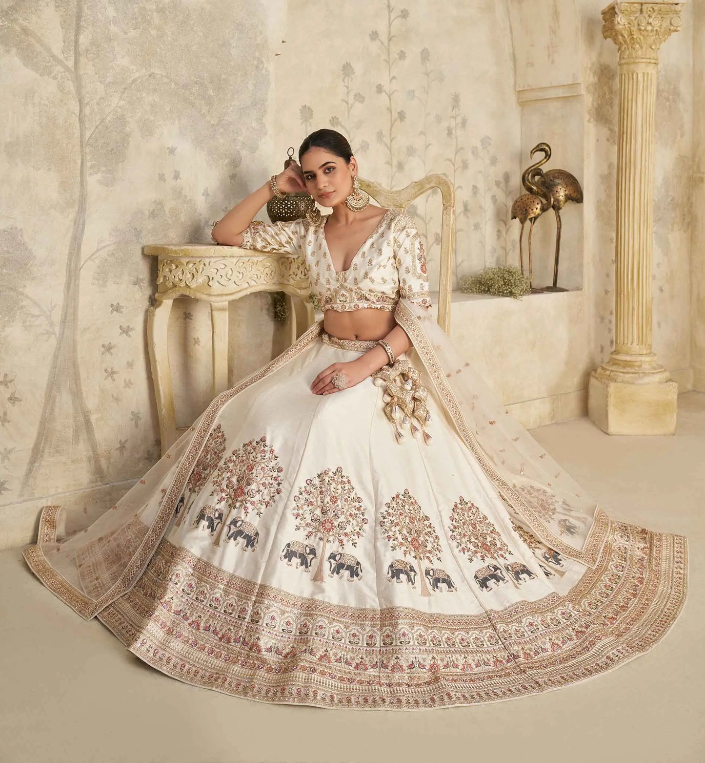 Cream Lehenga With Intricate Elephant Zari Work