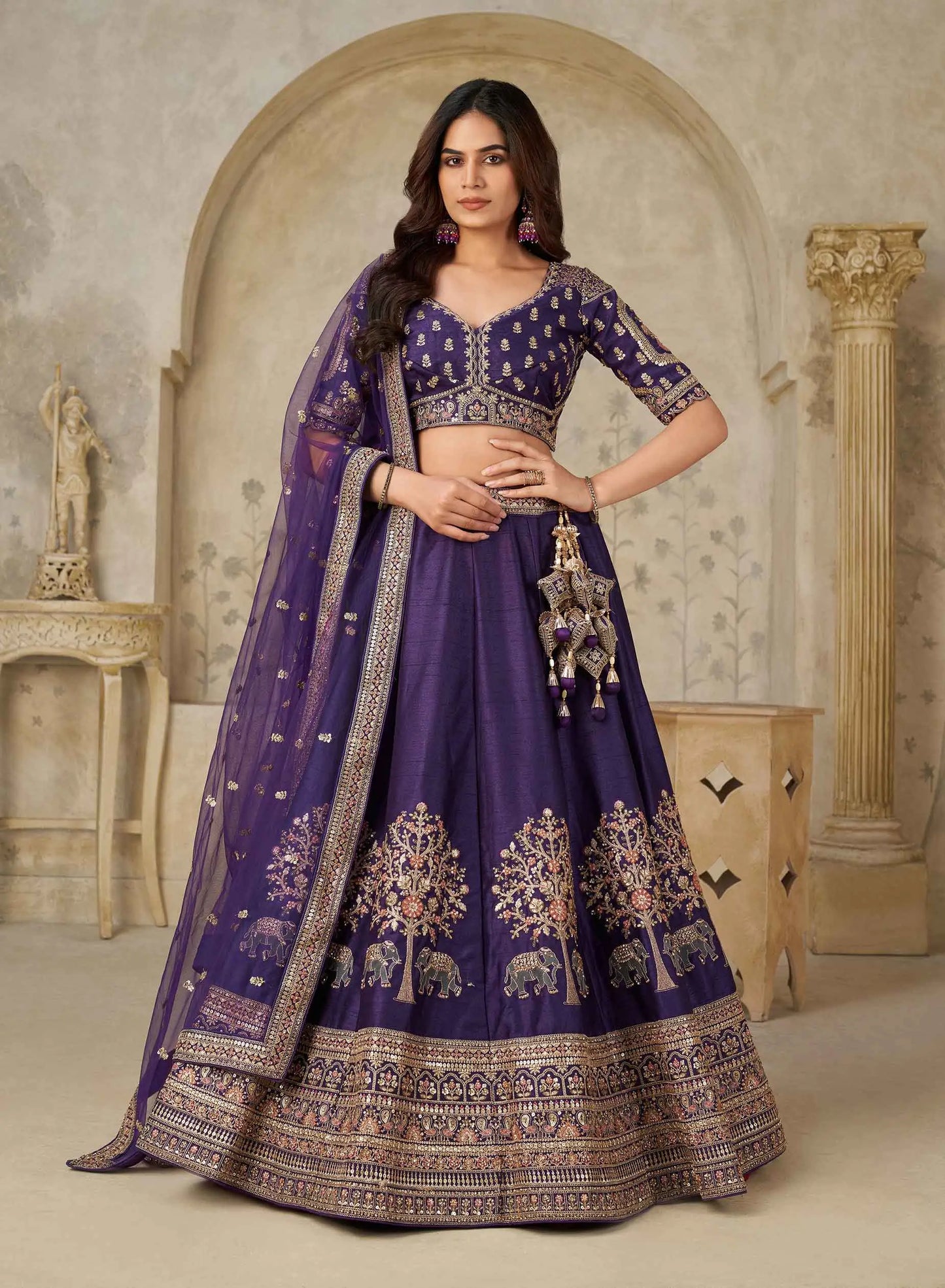 Royal Purple Wedding Lehenga With Elephant Motifs