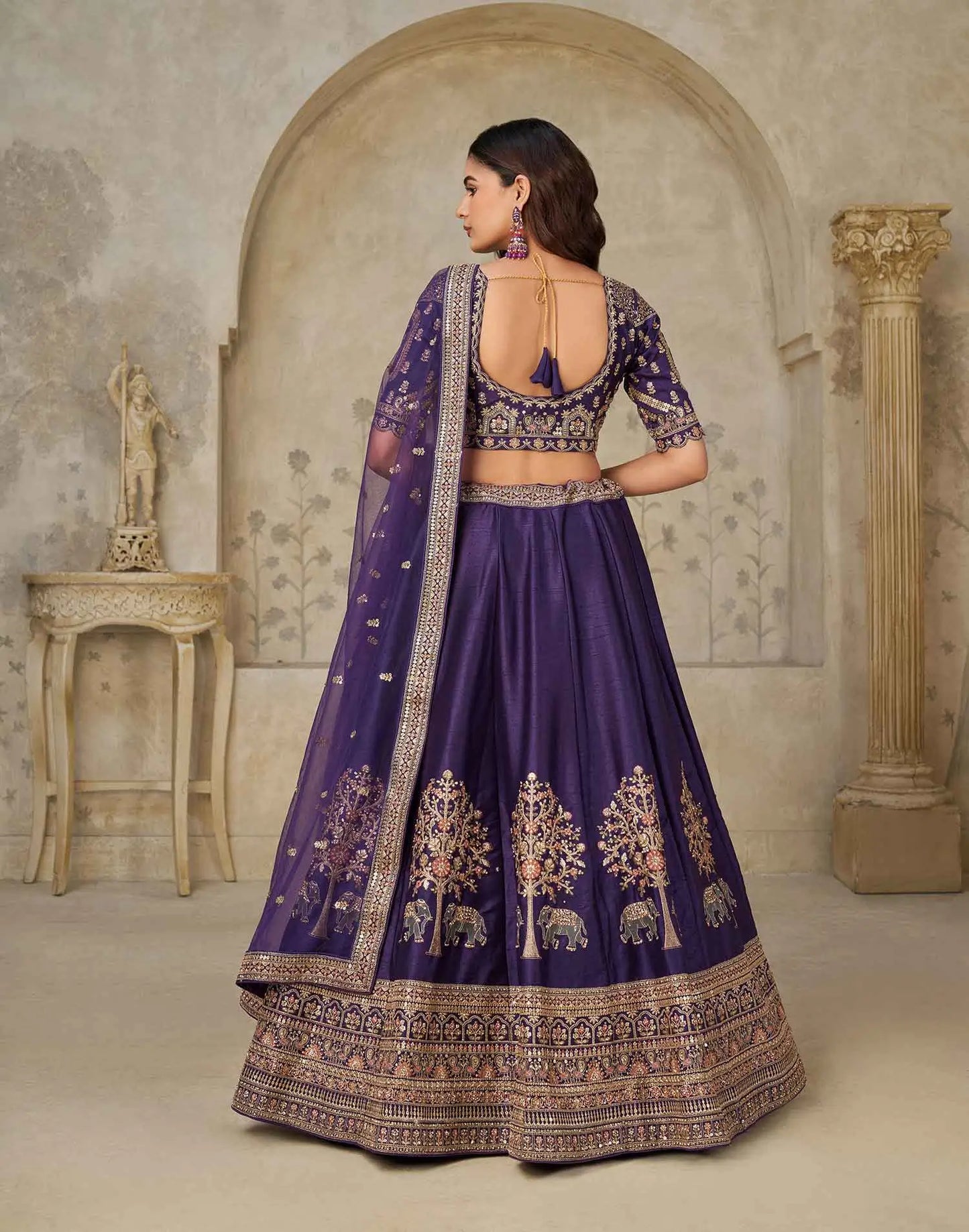 Royal Purple Wedding Lehenga With Elephant Motifs