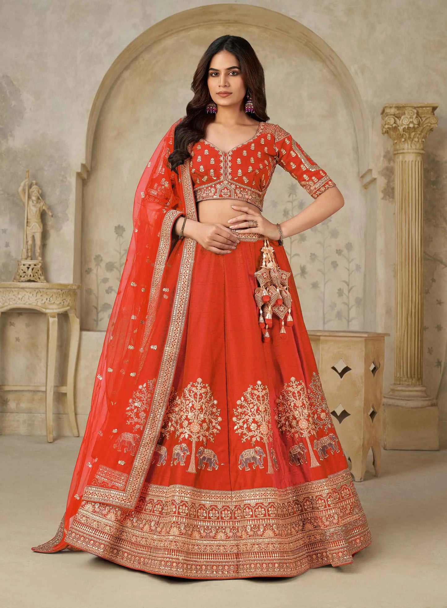 Trendy Rust Wedding Lehenga With Elephant Motifs