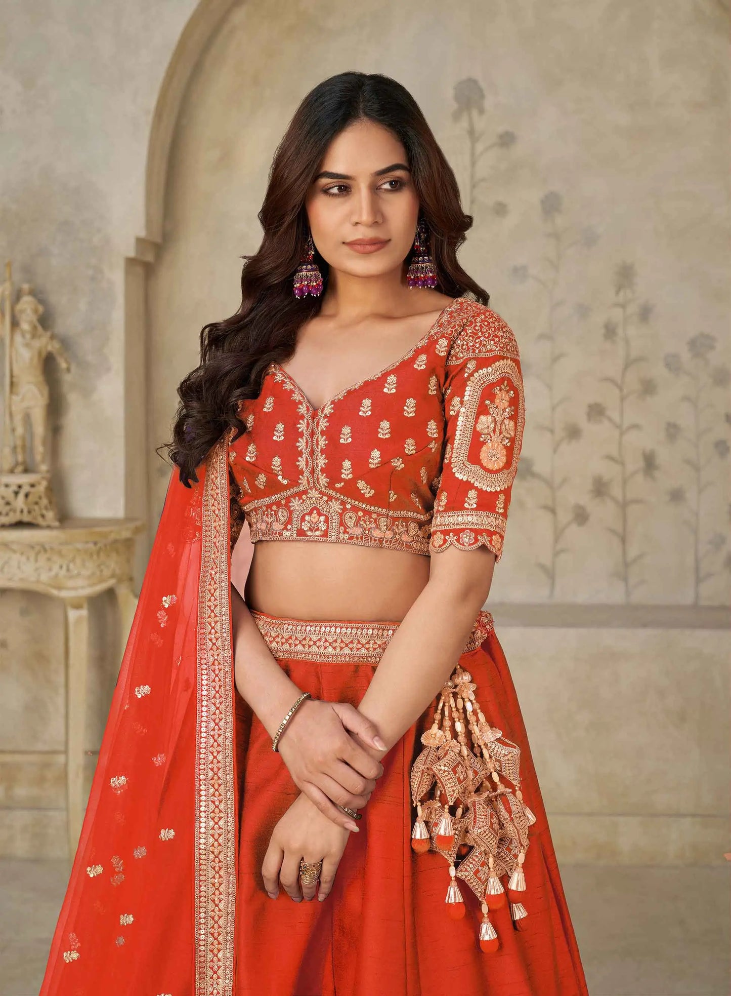 Trendy Rust Wedding Lehenga With Elephant Motifs