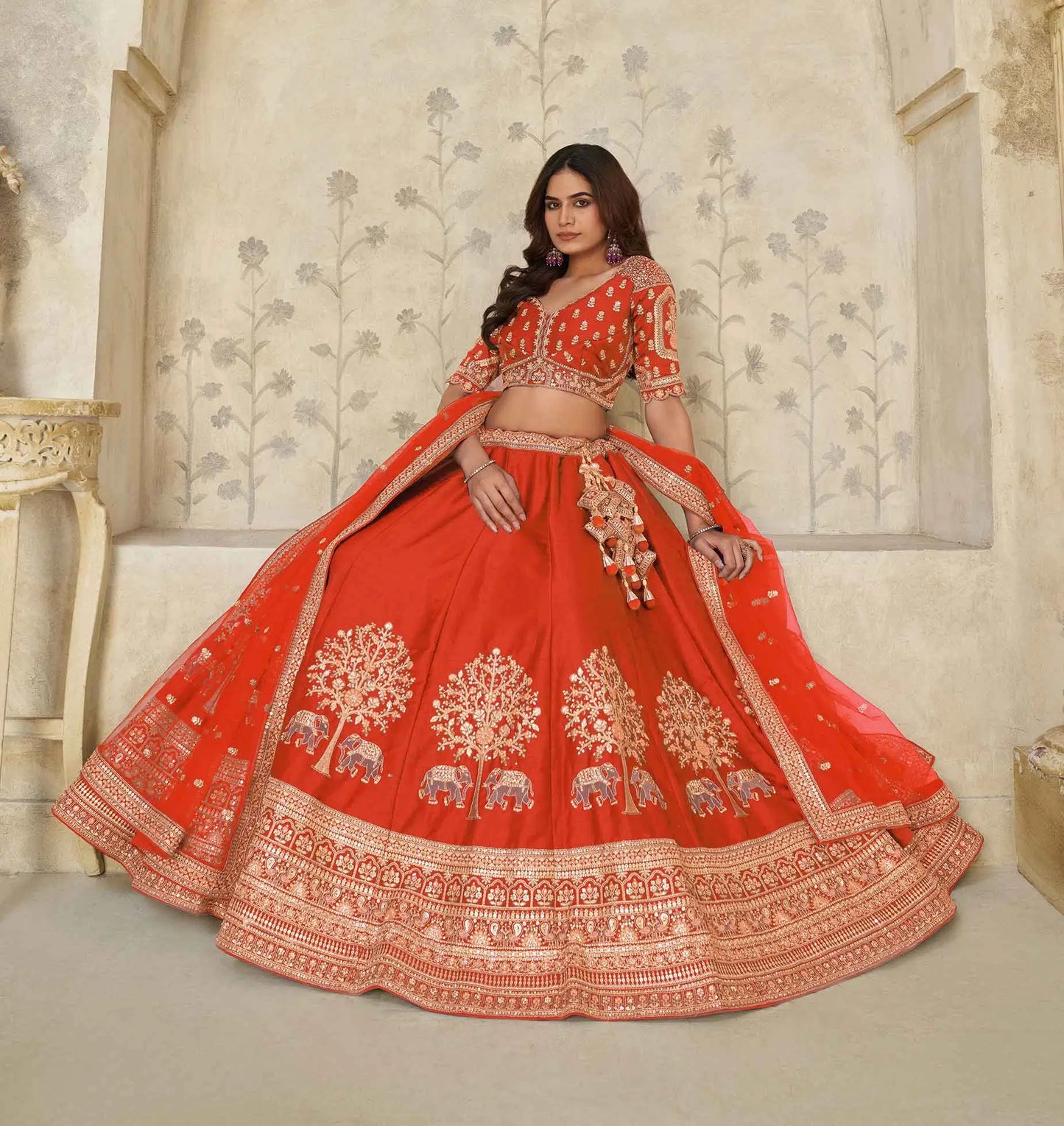 Trendy Rust Wedding Lehenga With Elephant Motifs