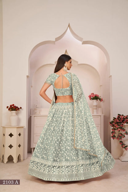 Turquoise Green Net Lehenga Choli With White Cotton Thread Work, Zari Work & Sequence Work