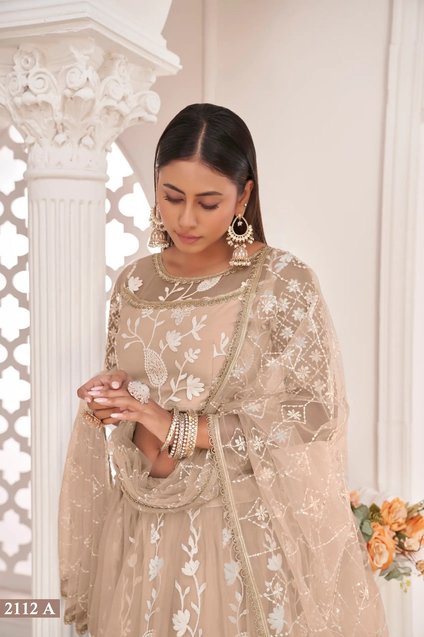 Beige Net Lehenga Choli With White Cotton Thread Work, Zari Work & Sequence Work