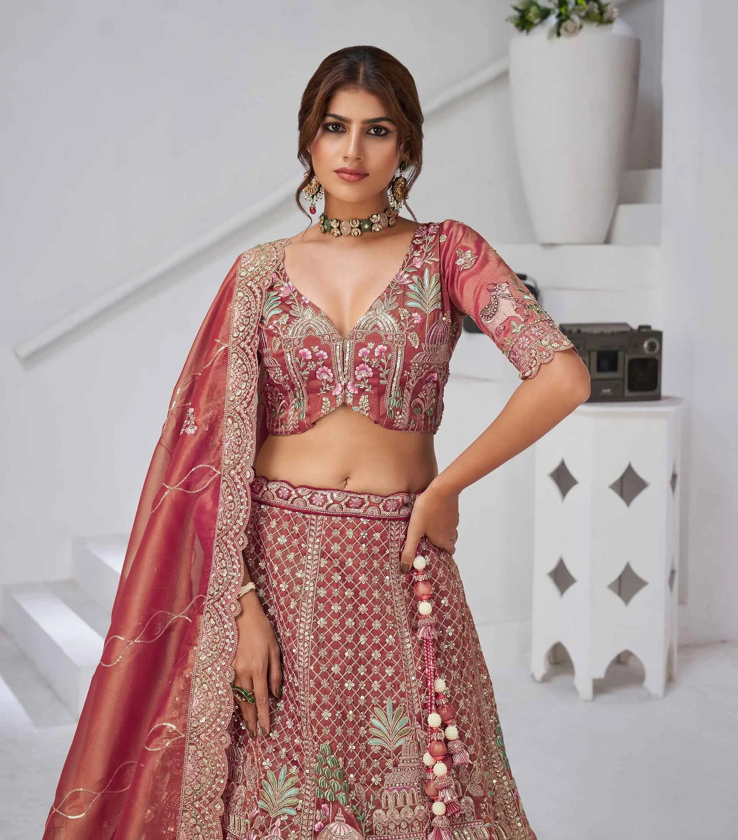 Pinkish Red Bridal Lehenga With Temple & Cow Motifs