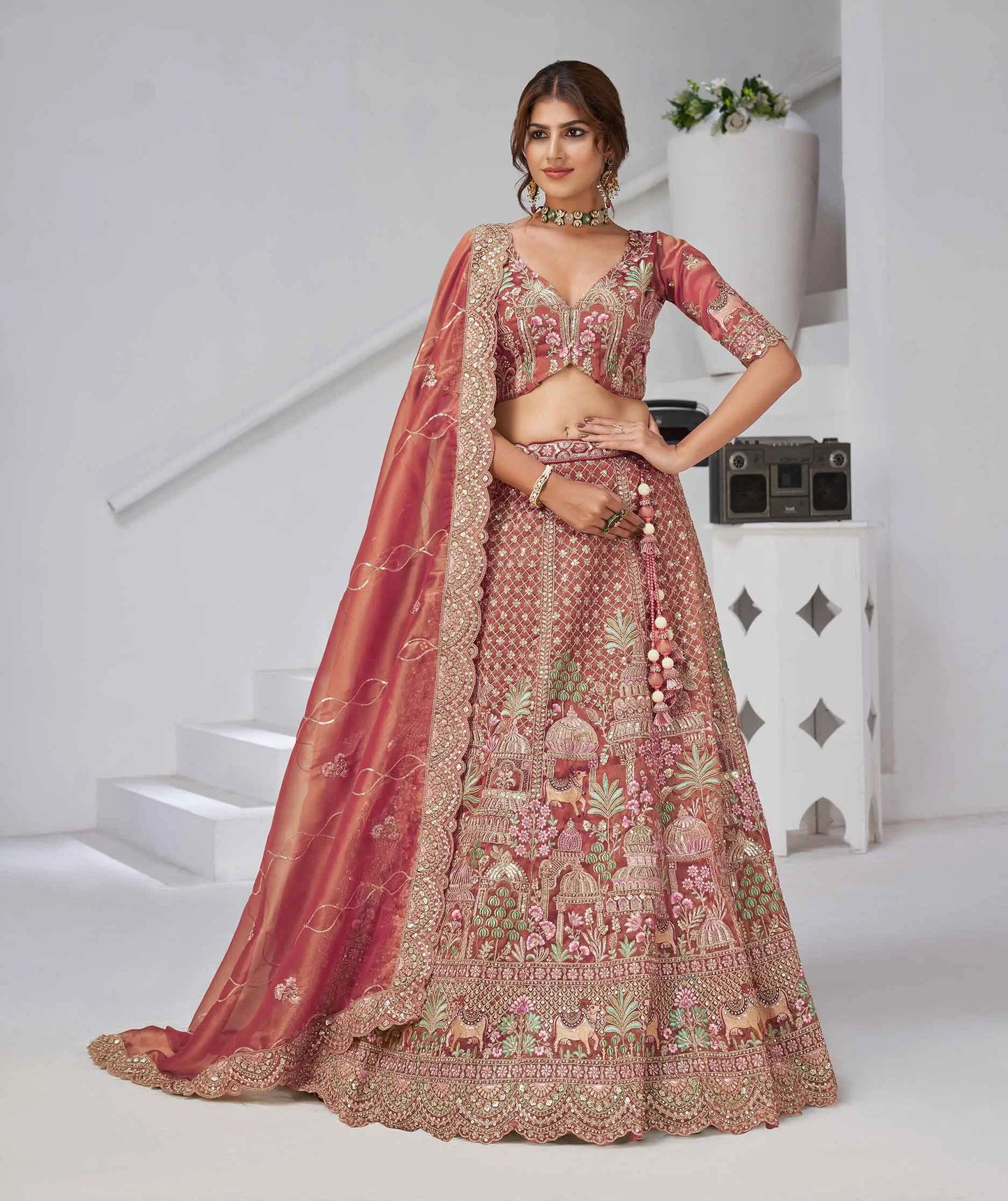 Pinkish Red Bridal Lehenga With Temple & Cow Motifs