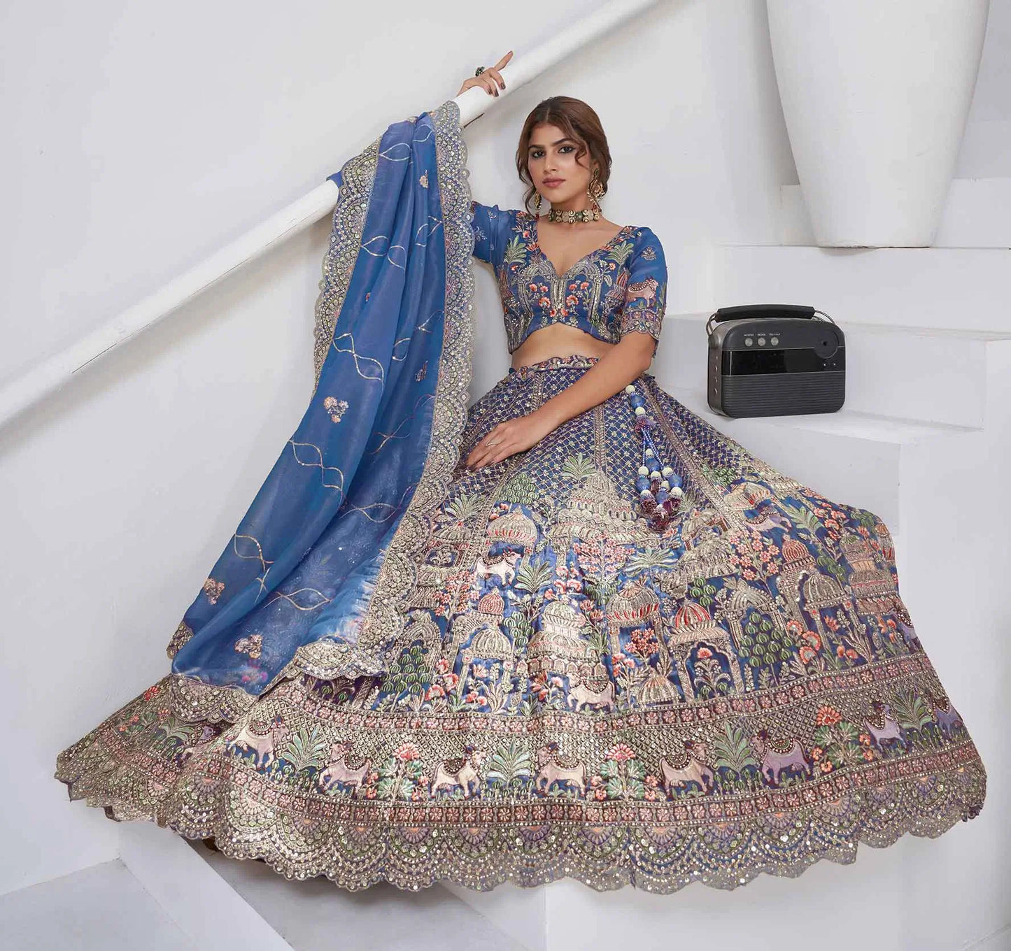Dusty Blue Bridal Lehenga With Temple & Cow Motifs
