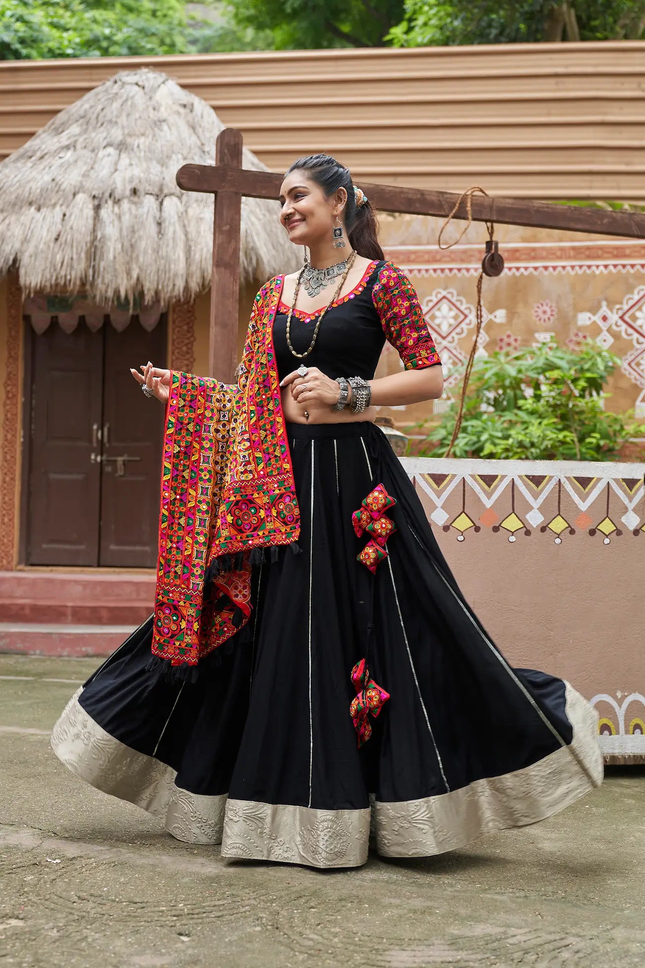 Black Viscose Rayon Navratri Lehenga Choli With Thread Embroidery & Mirror Work