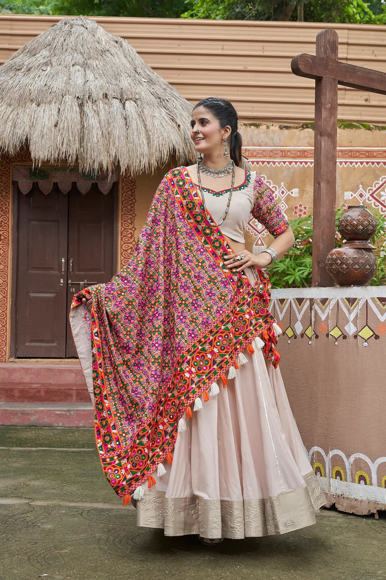Beige Viscose Rayon Navratri Lehenga Choli With Thread Embroidery & Mirror Work