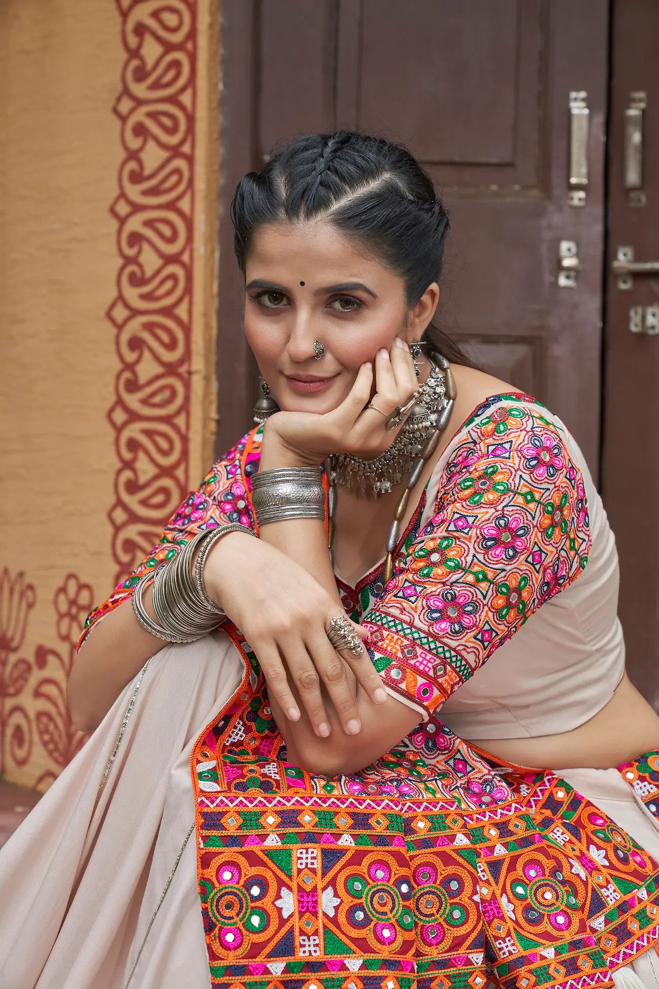 Beige Viscose Rayon Navratri Lehenga Choli With Thread Embroidery & Mirror Work