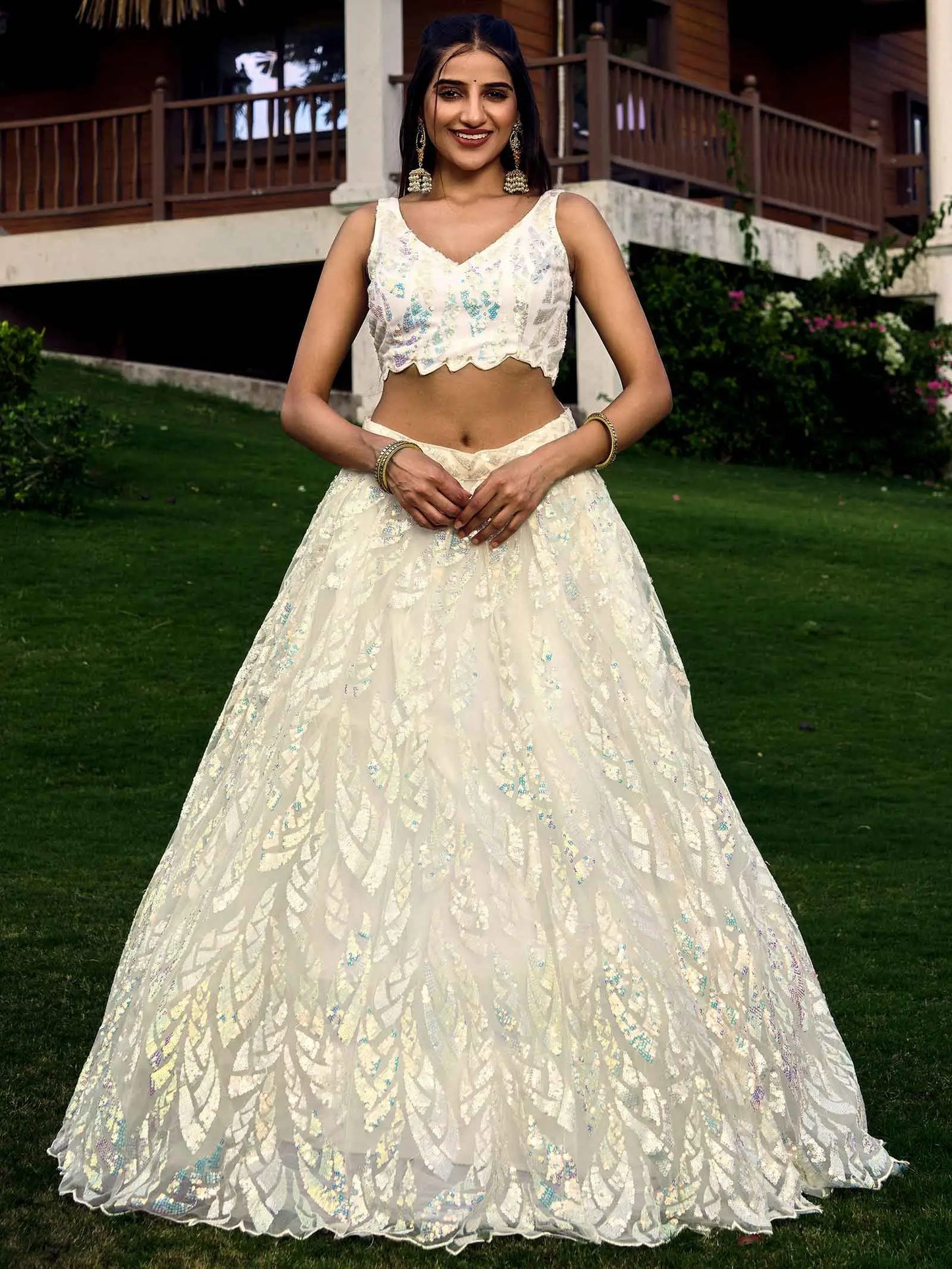 White Soft Net Lehenga With Multiple Sequins And Thread Embroidery Work