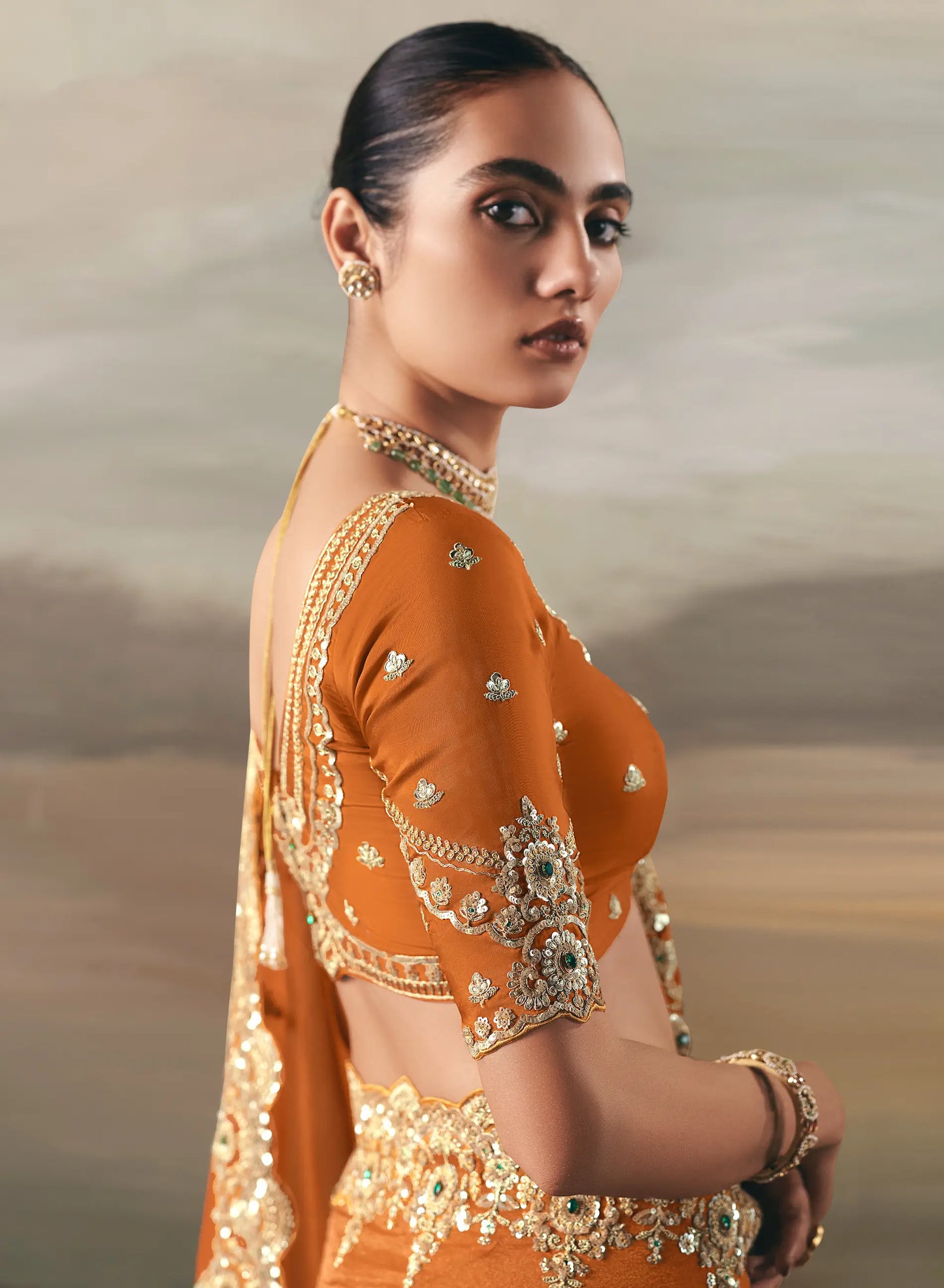 Bright Orange Heavy Embroidered Tissue Silk Saree