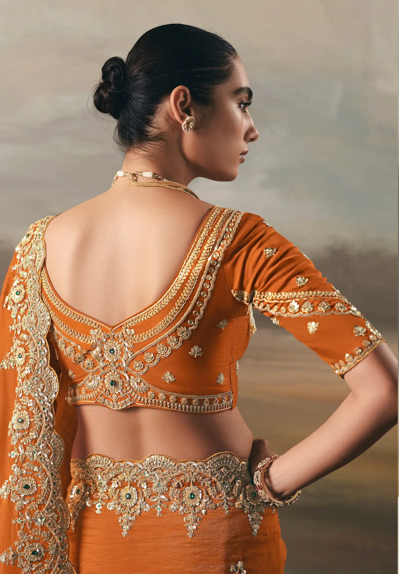 Bright Orange Heavy Embroidered Tissue Silk Saree