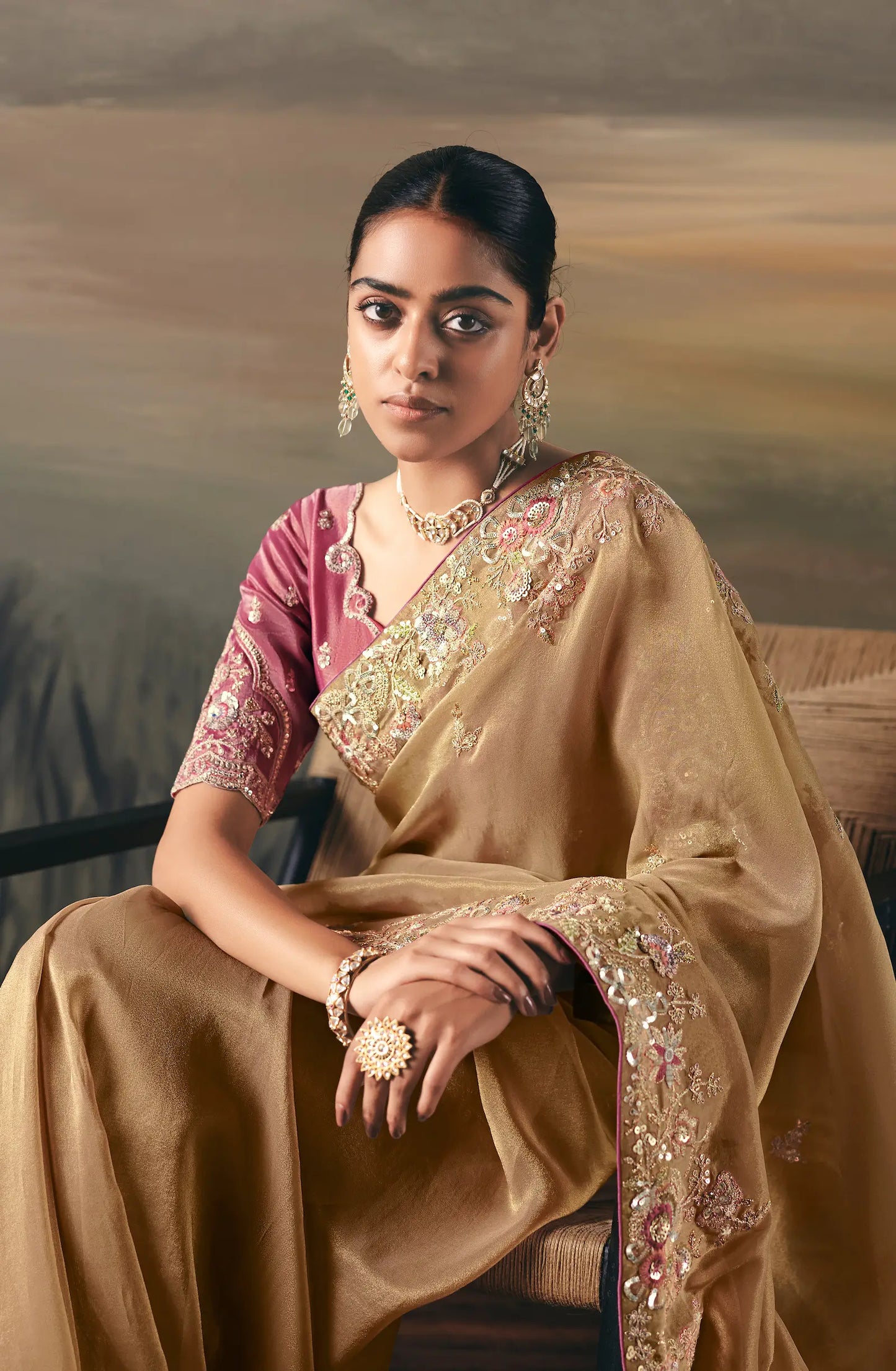 Shiney Beige Heavy Embroidered Tissue Silk Saree