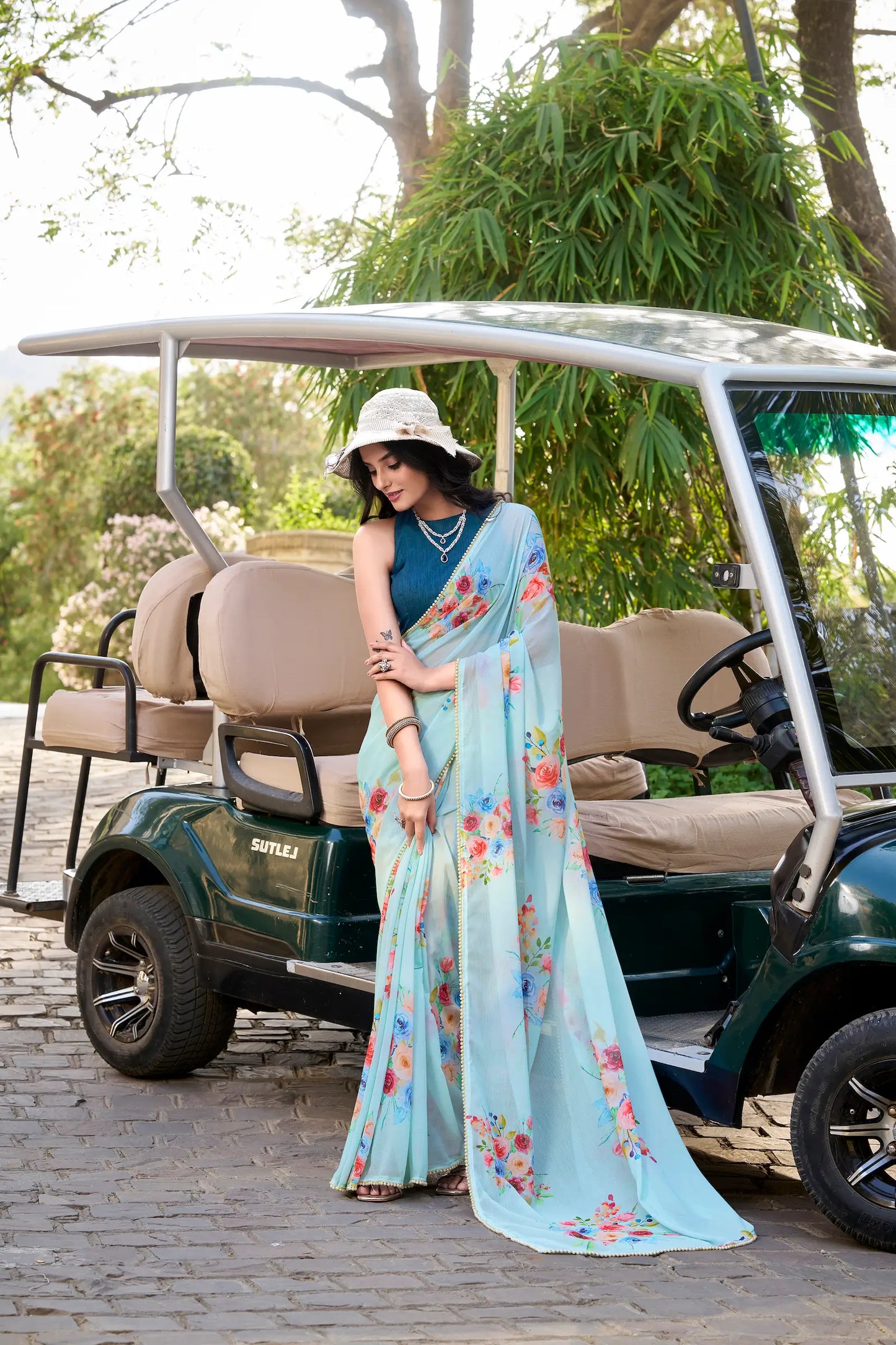 Sea Blue Weightless Marbal Saree With Floral Print & Lace Border