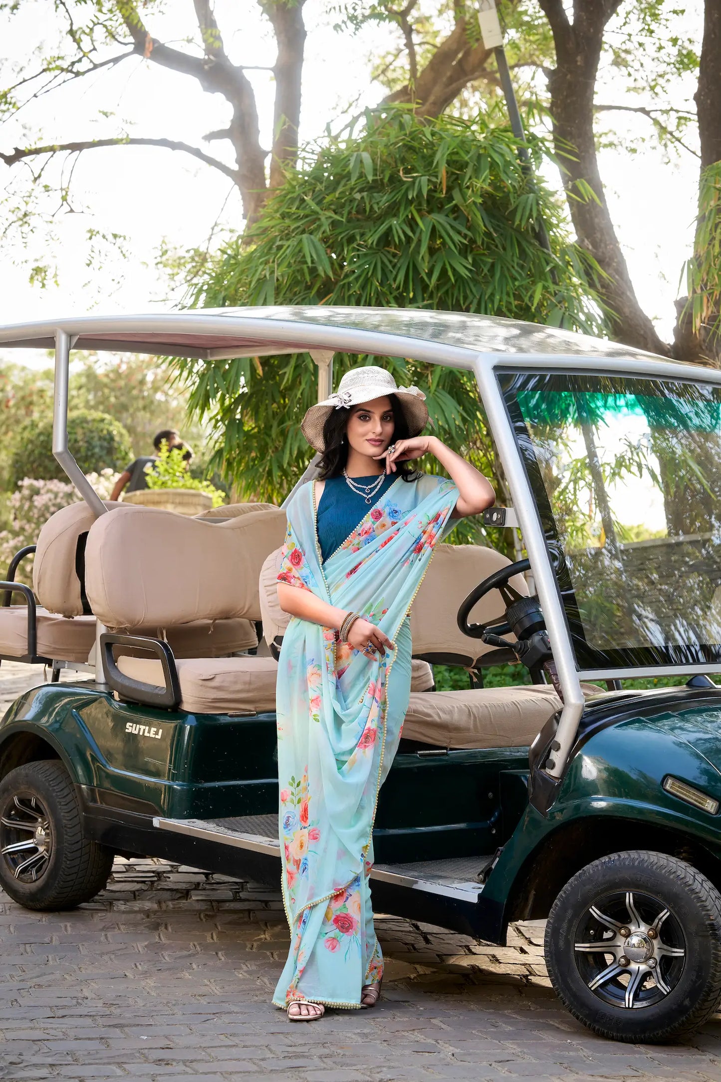 Sea Blue Weightless Marbal Saree With Floral Print & Lace Border