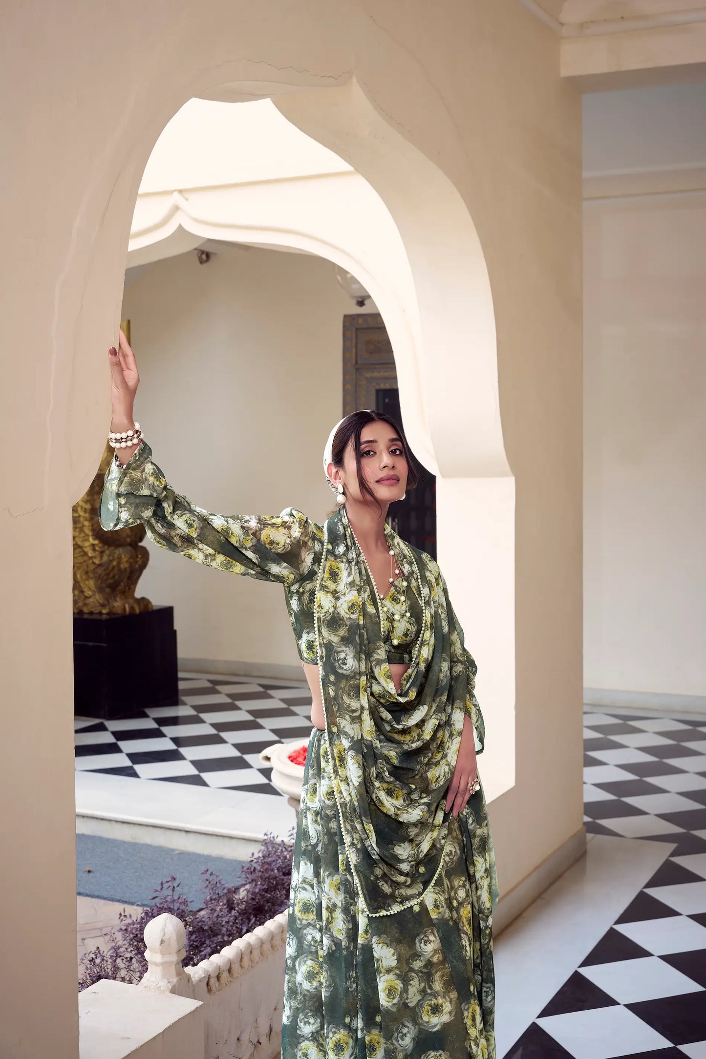 Olive Green Weightless Marbal Saree With  Pearl Lace Border & Floral Print