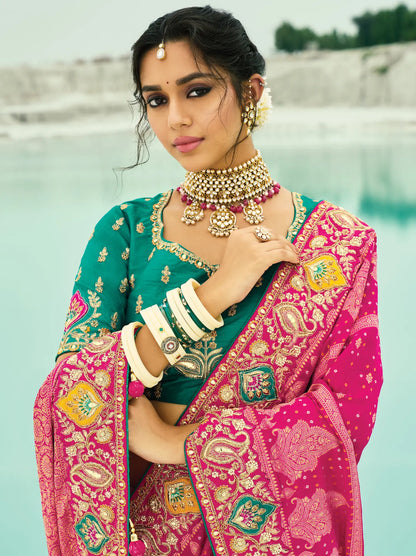 Rani Pink Georgette Heavy Embroidered Bandhej Saree