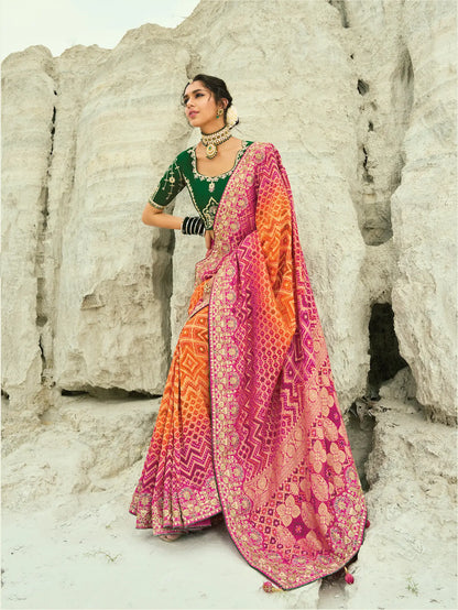 Orange-Rani pink Georgette Heavy Embroidered Bandhej Saree
