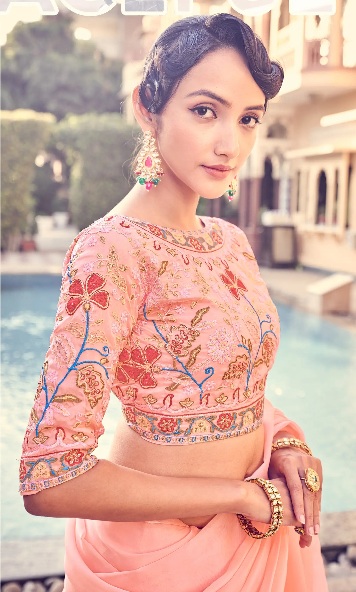 Peach Pink Organza Ruffle Saree With Embroidered Blouse