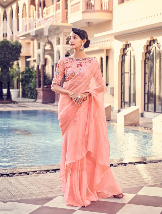 Peach Pink Organza Ruffle Saree With Embroidered Blouse
