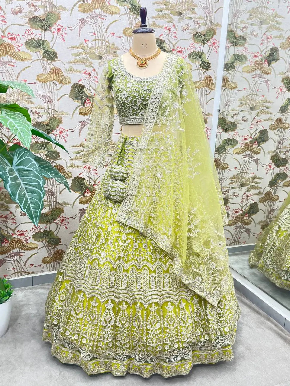 Light Olive Green Shining Thread  Embroidery Design Net Lehenga Choli