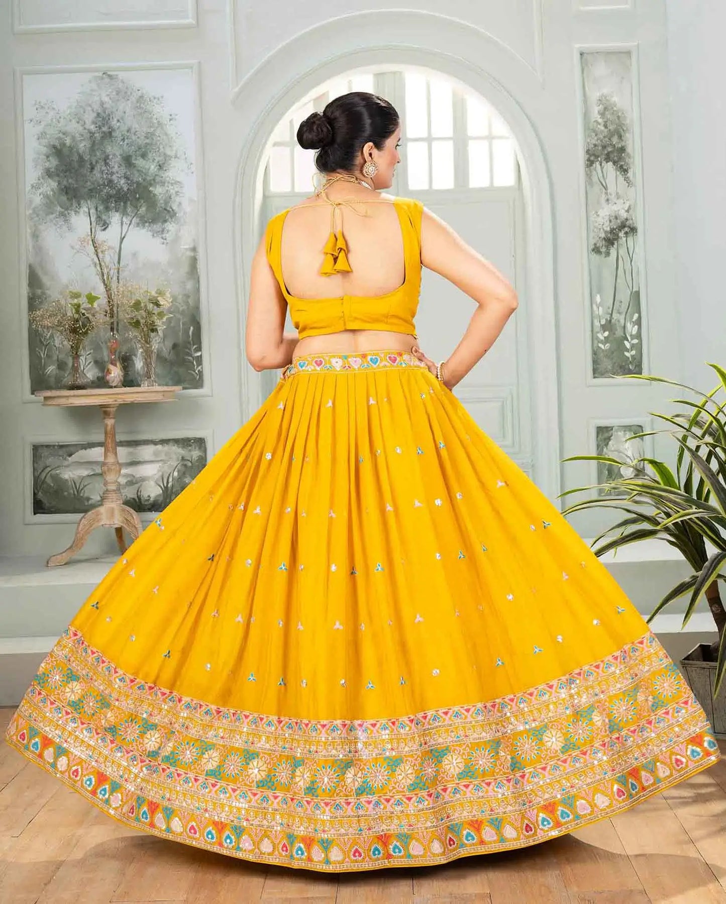 Yellow Star Georgette Sequins Embroidery Work Lehenga Choli