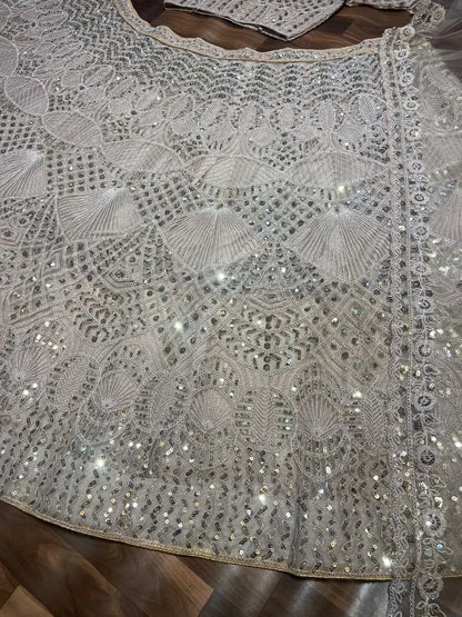Off White Net Lehenga Embellished With Heavy Sequins And Heavy Dori Work